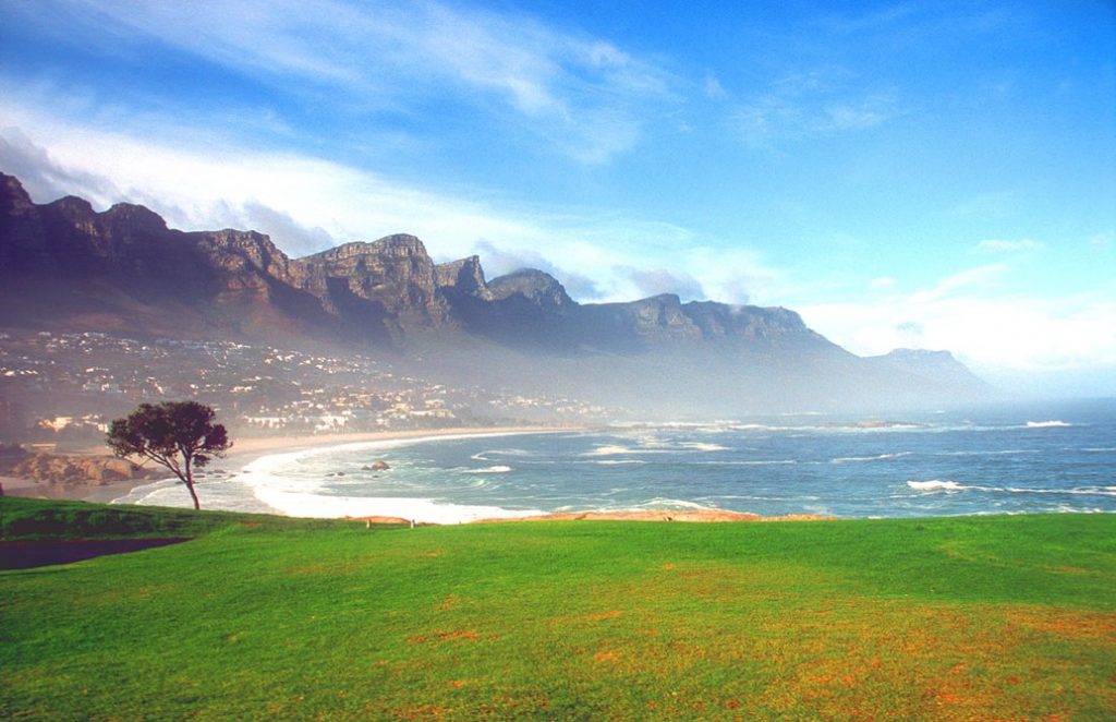 CPT Camps Bay beach with Twelve Apostles mountains in the morning b